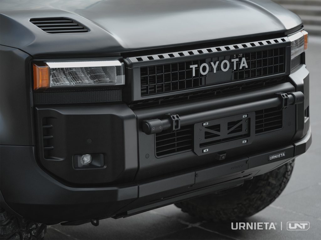 URNIETA LC250 Front Fascia Kit on a Toyota Land Cruiser 250, straight-on close-up of the front fascia with hood vent and mini bull bar