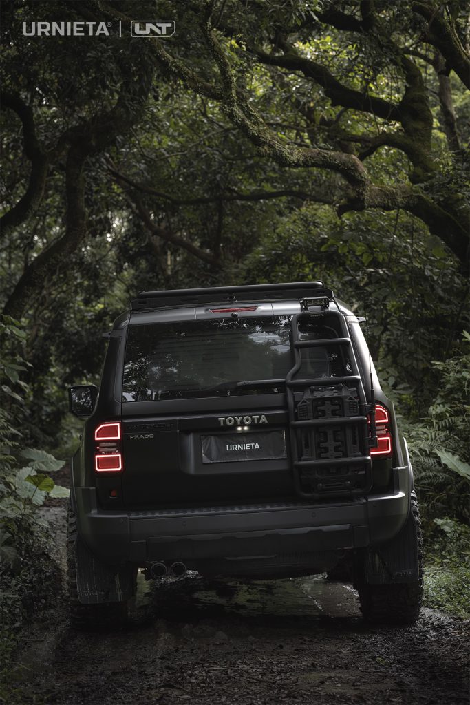 URNIETA Rear Ladder Kit for Land Cruiser 250, rear view of the ladder on a forest trail