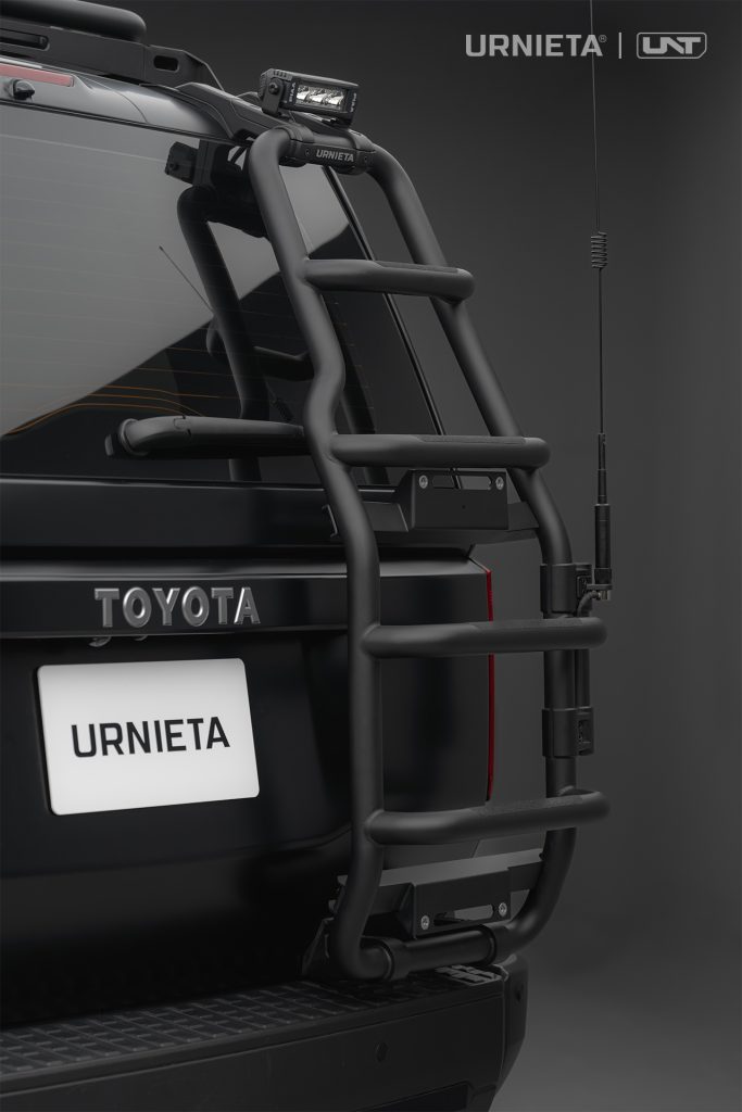 URNIETA Rear Ladder Kit for Land Cruiser 250, studio rear view of the bare ladder with antenna